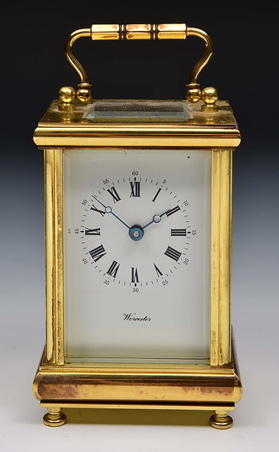 Appraisal: Brass carriage clockwith enamel dial and loop handle