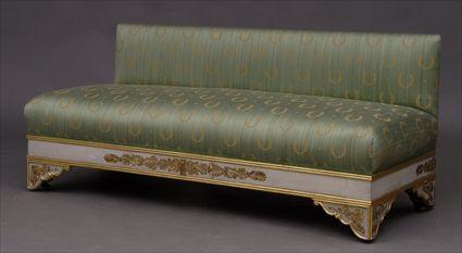 Appraisal: EMPIRE-STYLE CARVED PAINTED AND PARCEL-GILT BANQUETTE The low back and