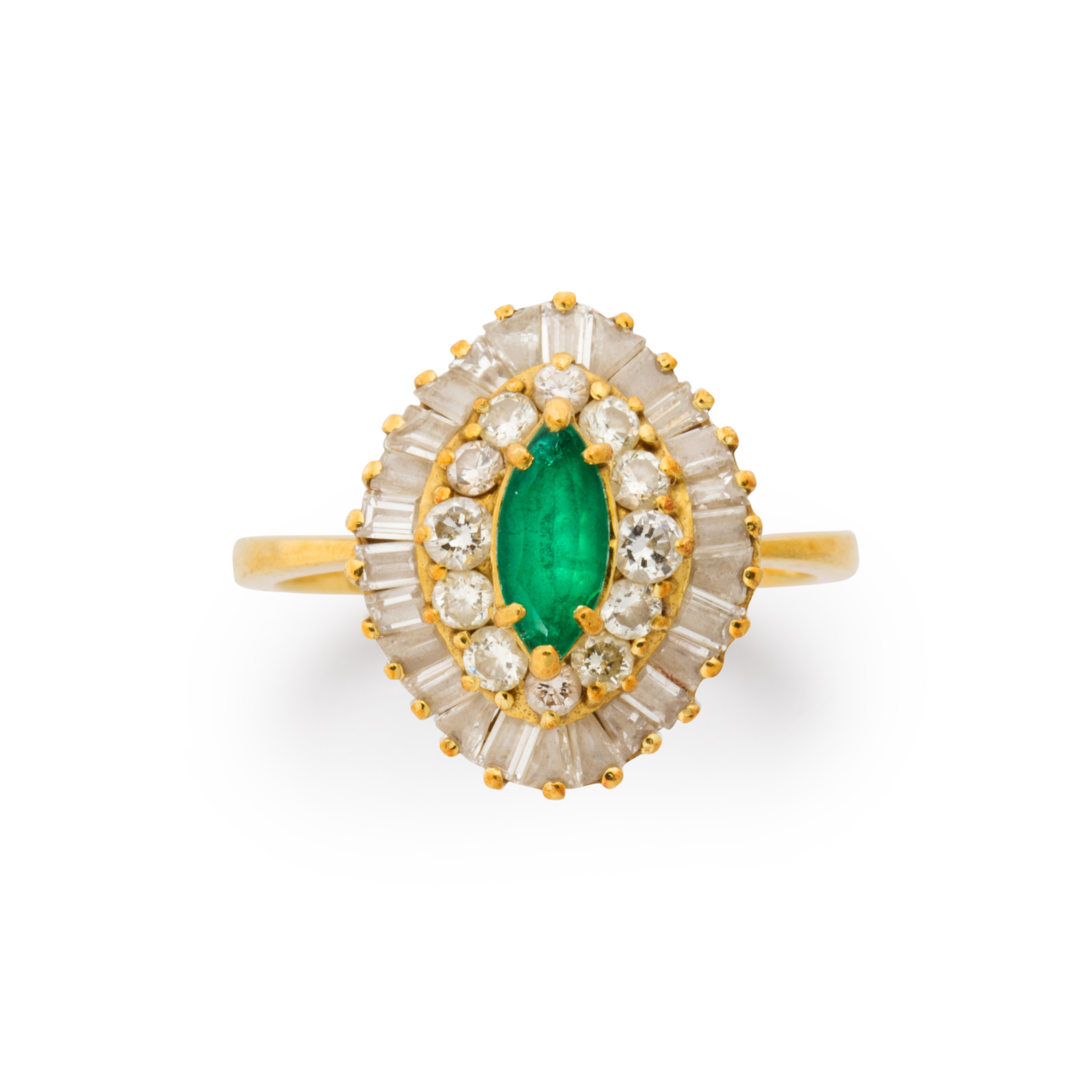 Appraisal: AN EMERALD DIAMOND AND EIGHTEEN KARAT GOLD RING An emerald