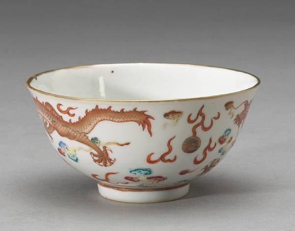 Appraisal: A polychrome enamel porcelain dragon bowl Guangxu Mark and Period