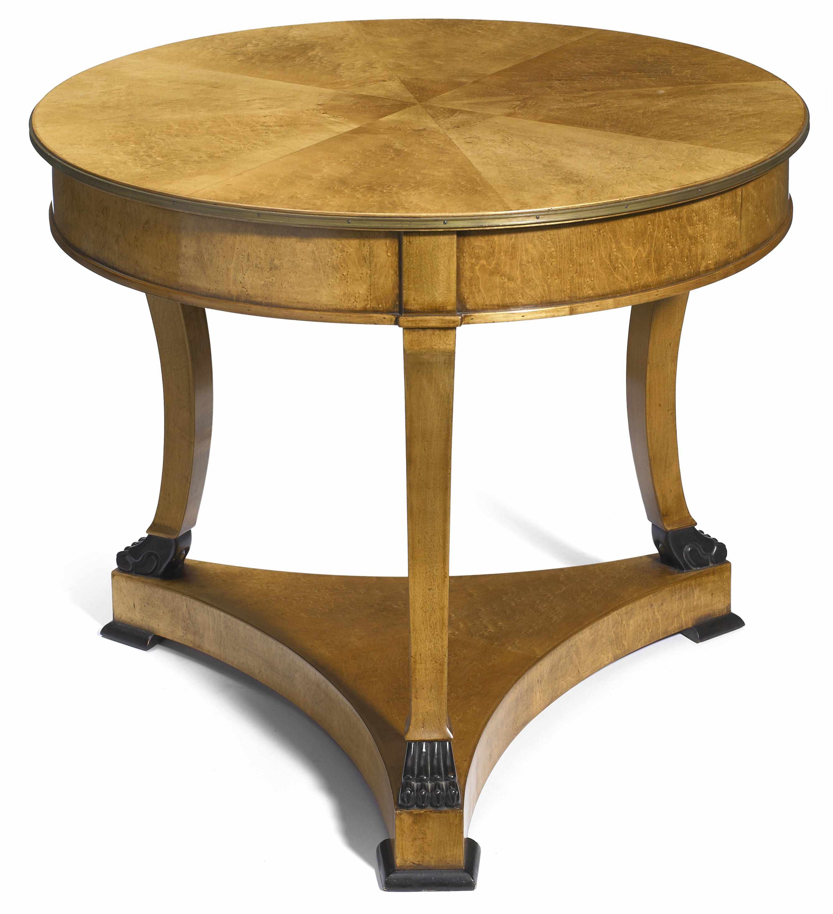 Appraisal: A Biedermeier style parcel ebonized ash center table height in