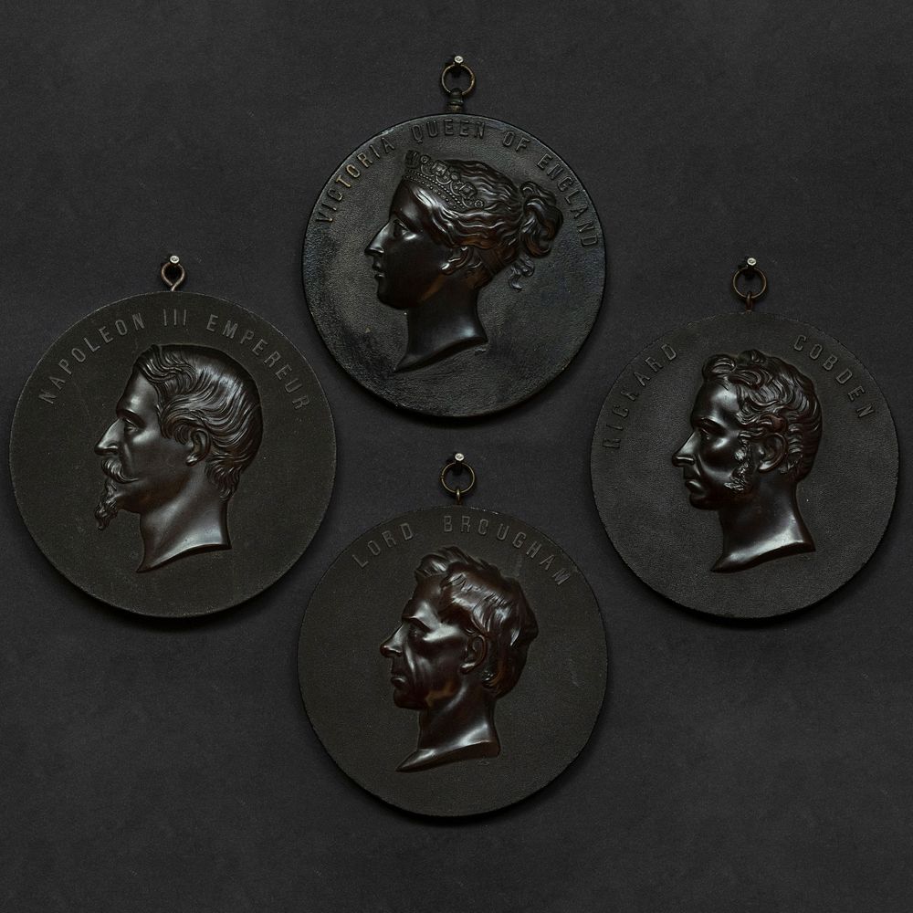 Appraisal: Four French Bronze and Bois Durci Profile Portrait Plaques Including