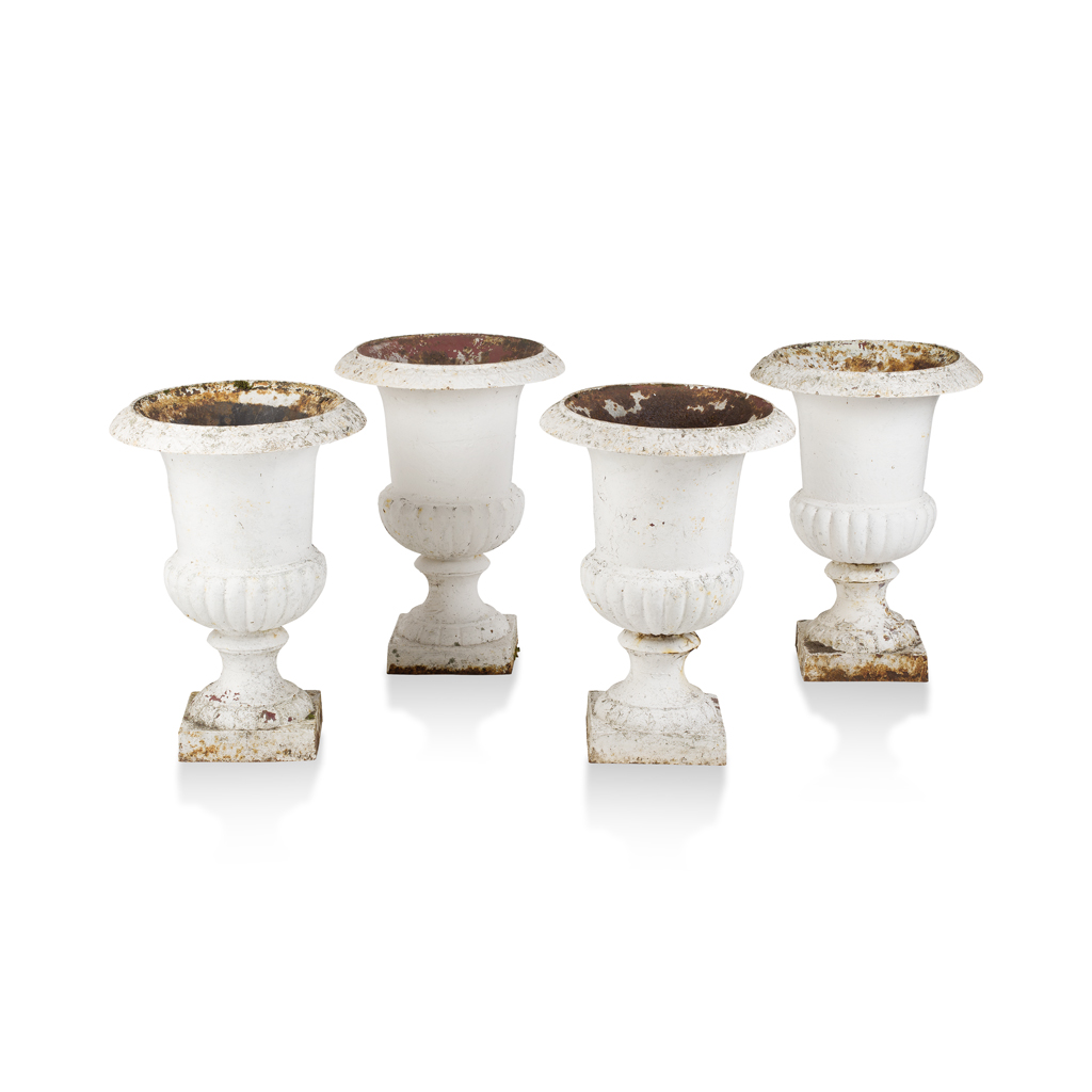 Appraisal: SET OF FOUR WHITE PAINTED CAST IRON URNS of campana