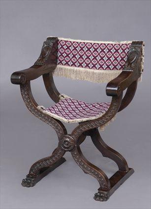 Appraisal: PAIR OF ITALIAN RENAISSANCE-STYLE CARVED WALNUT SAVONAROLA CHAIR Each with