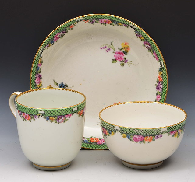 Appraisal: Derby porcelain triocirca decorated in polychrome enamels with flower sprays