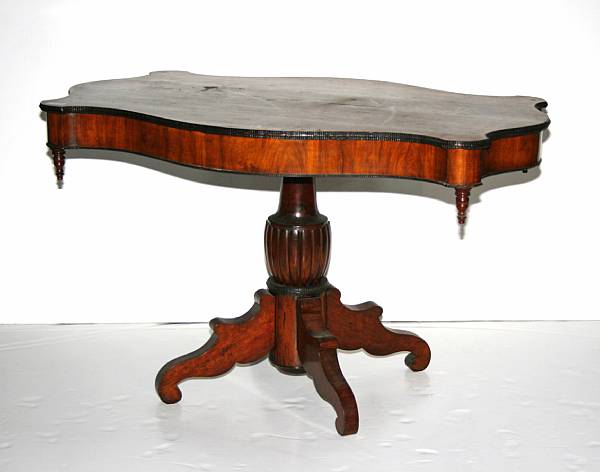 Appraisal: A Victorian parcel ebonized walnut center table third quarter th