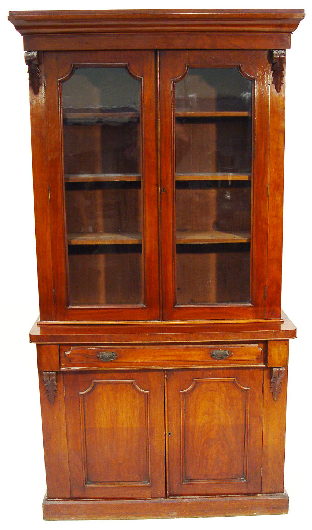 Appraisal: Victorian walnut bookcase the moulded cornice above a pair of