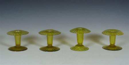 Appraisal: A set of four yellow irridescent Venetian Murano glass vases