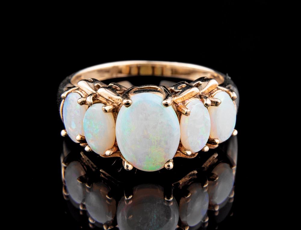 Appraisal: Yellow Gold and Opal Ring set with oval Australian opals