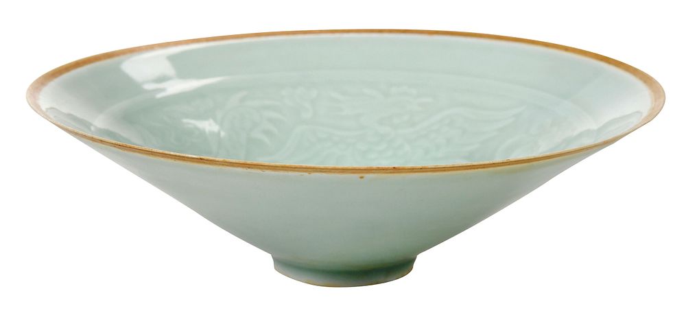 Appraisal: Celadon Dragon and Phoenix Bowl Chinese possibly Song dynasty green