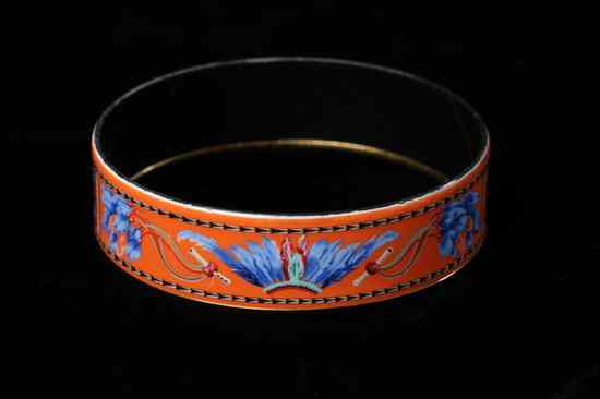 Appraisal: HERM S ENAMELLED AND GOLD-PLATED BANGLE BRACELET Signed Made in