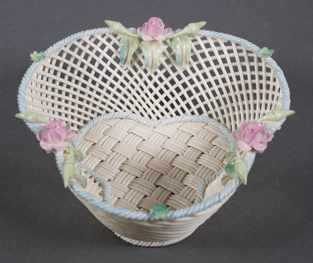 Appraisal: Belleek Masterpiece Collection basket Four-strand two pad Belleek mark on