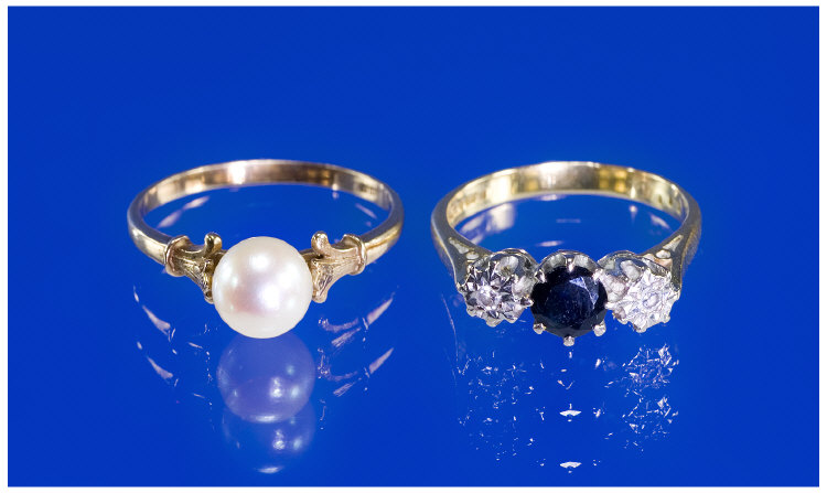 Appraisal: ct Gold Sapphire And Diamond Ring Central Sapphire Between Two