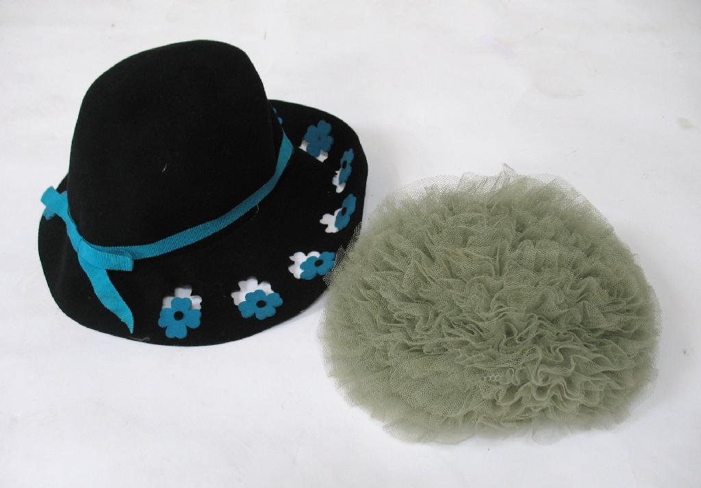 Appraisal: A 's style black felt hat with blue felt flower