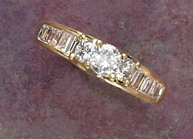 Appraisal: THREE STONE DIAMOND RING k yellow gold ring set with