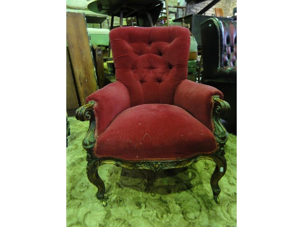 Appraisal: A Victorian drawing room chair with serpentine upholstered seat and