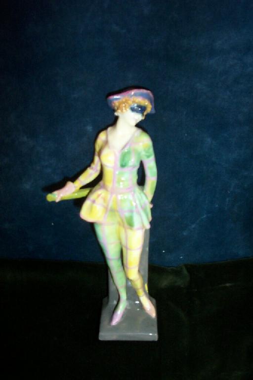 Appraisal: A Royal Doulton figure of a girl in yellow green