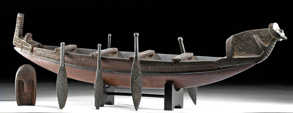 Appraisal: th C Maori Wood Model Canoe w Paddles Oceania New