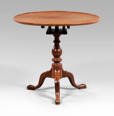 Appraisal: Pennsylvania Chippendale tea table walnut dished top over birdcage support