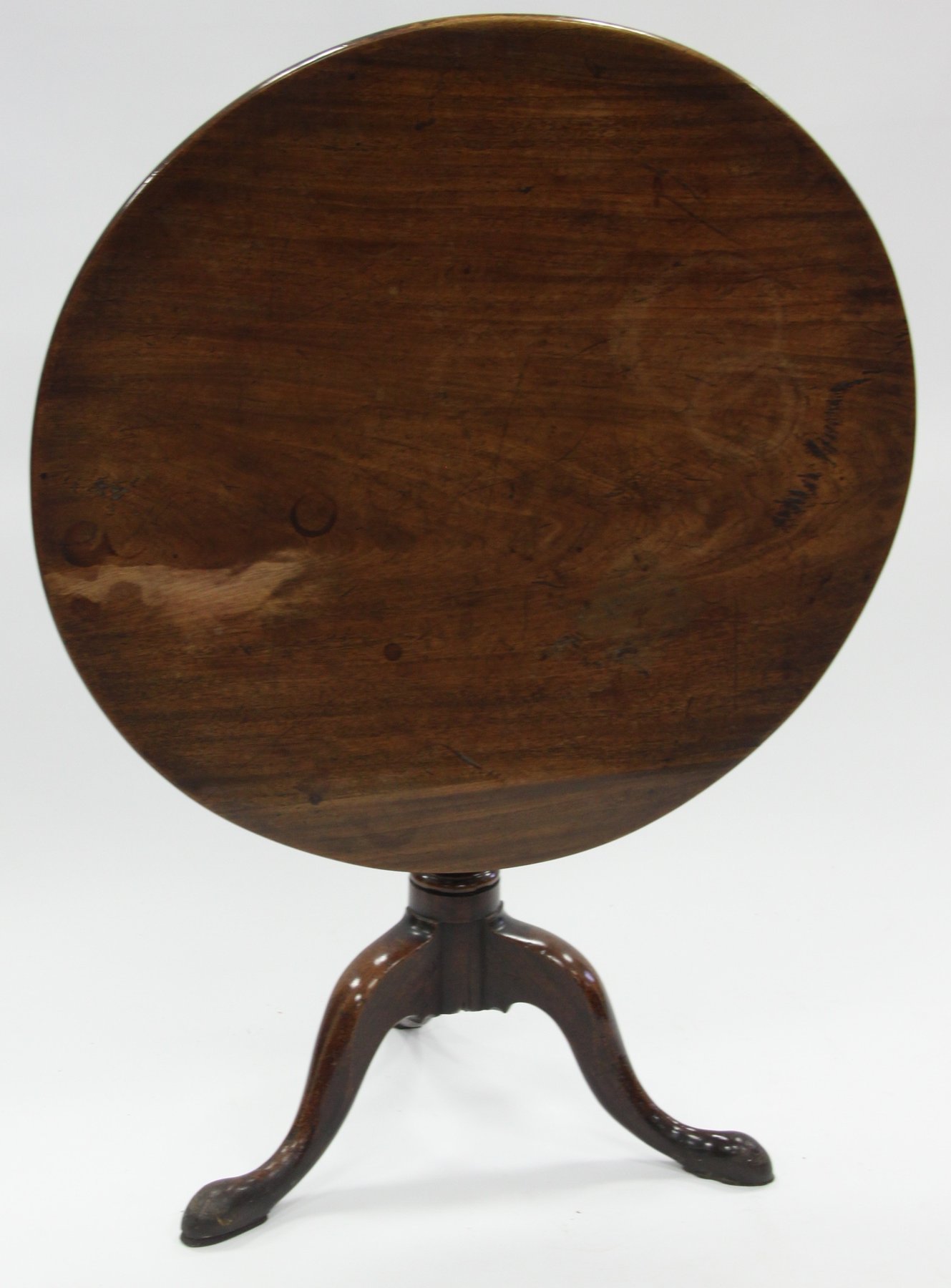 Appraisal: A George III mahogany supper table the circular top on