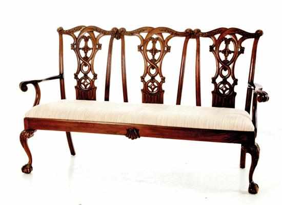 Appraisal: Chippendale style carved mahogany triple-back settee late th century shaped