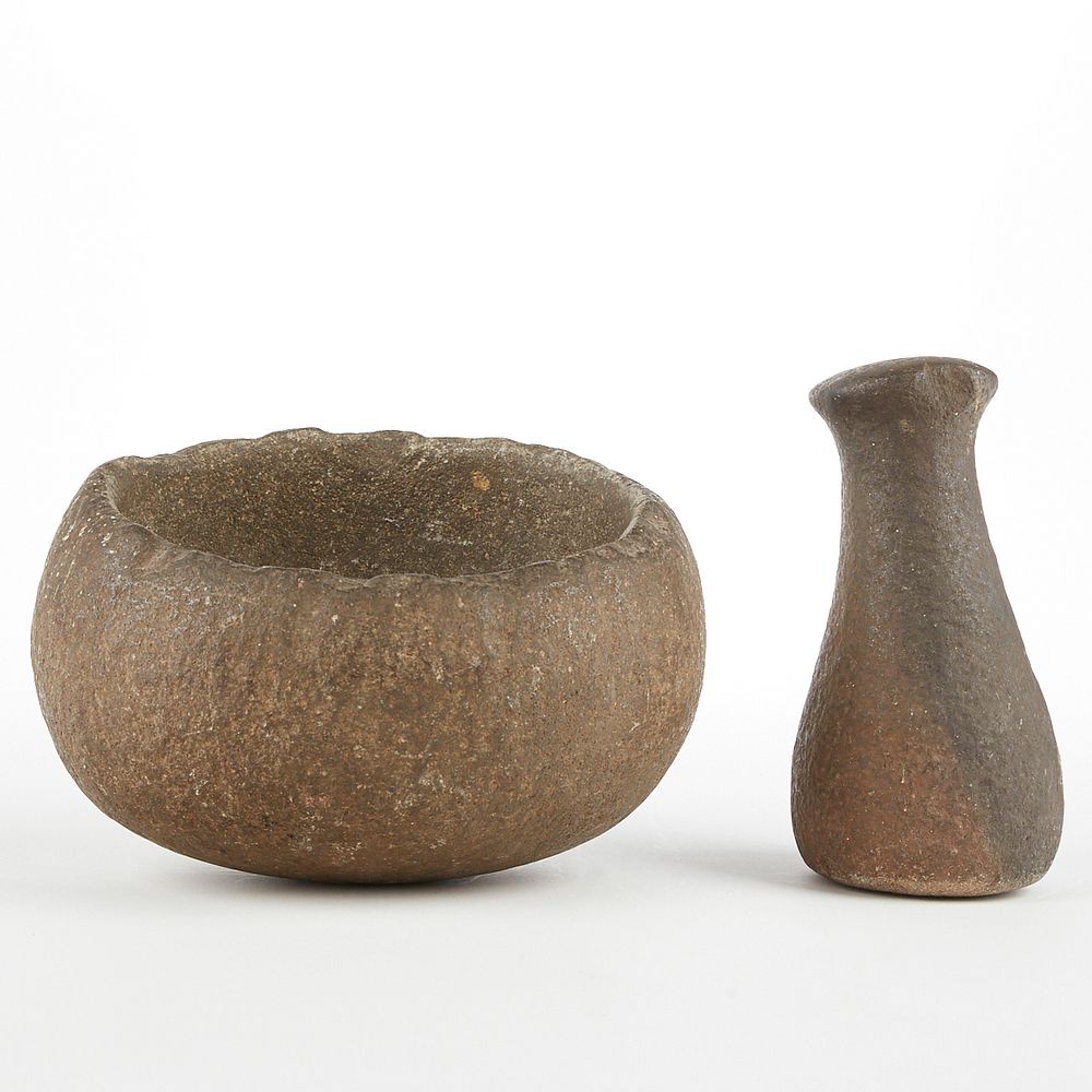 Appraisal: North American Stone Mortar and Pestle North American stone mortar