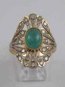 Appraisal: A Russian Soviet hallmarked ct gold cabochon emerald and diamond