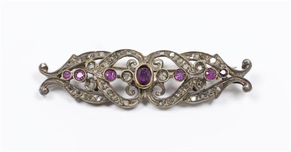 Appraisal: RUBY AND DIAMOND BROOCH Silver and pink gold Decorative antiqued