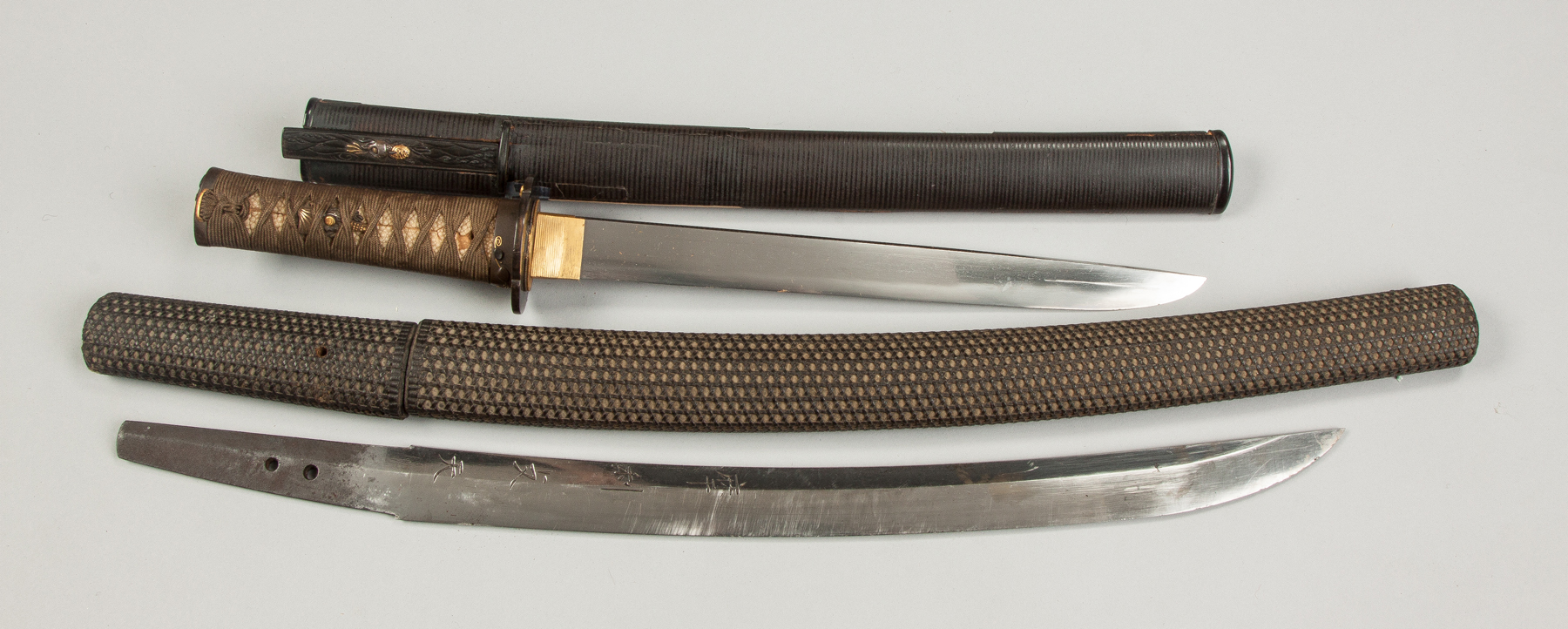 Appraisal: Two Wakizashi Top Inscribed kozuka blade Suguha with ashi blade