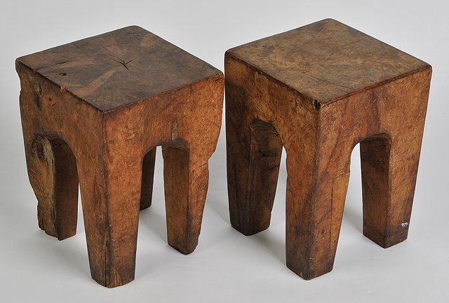 Appraisal: A PAIR OF NATURALISTIC OAK FOOT STOOLS on thick square