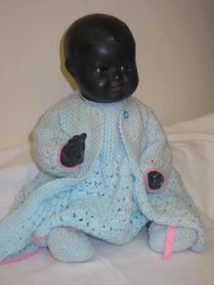 Appraisal: A Plastex composition black baby doll with brown glass sleeping