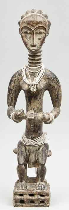 Appraisal: A Baule maternity figure Ivory Coast second half th century