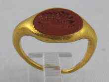 Appraisal: A yellow metal tests high carat gold intaglio ring probably