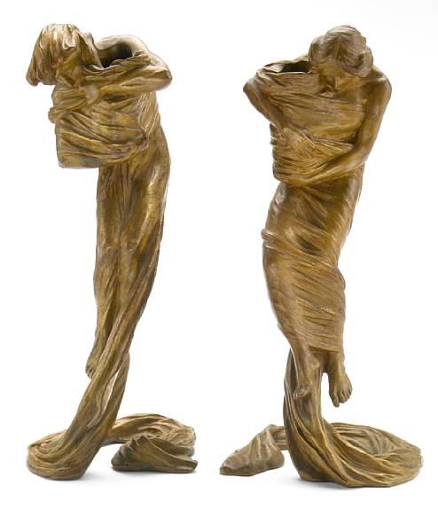 Appraisal: A pair of Gustav Gurschner bronze figural candlesticks circa model