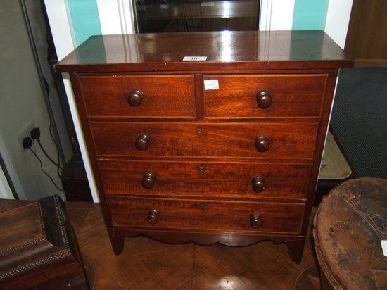 Appraisal: A Victorian mahogany miniature chest of two short and three