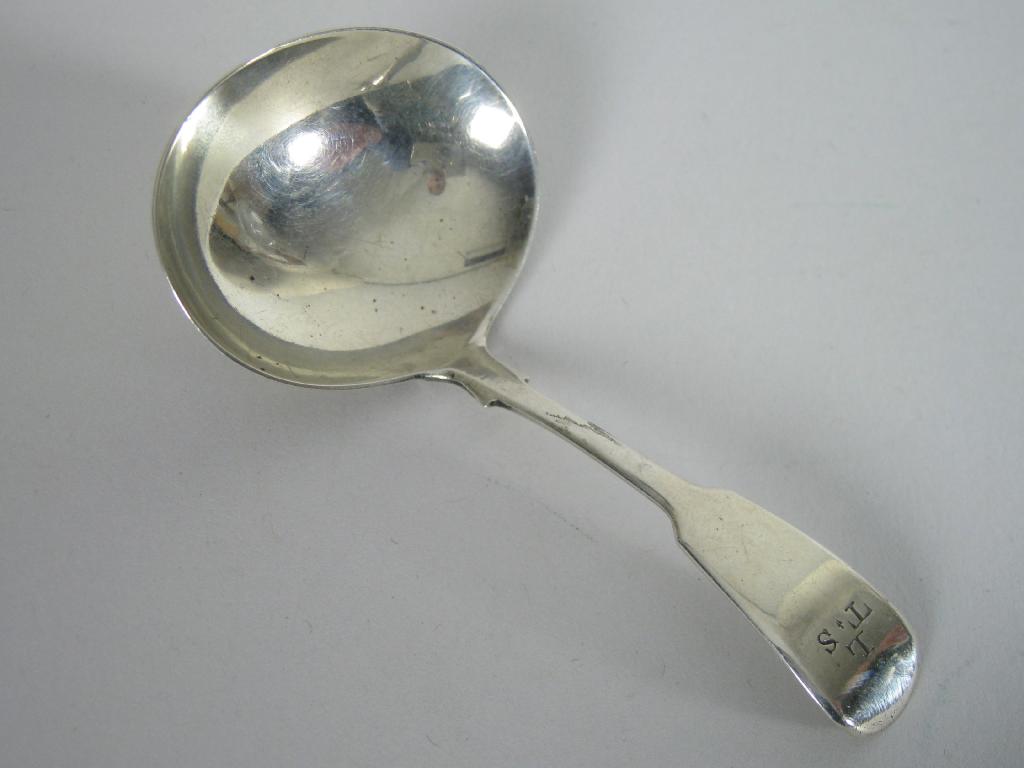 Appraisal: A George III Caddy Spoon Fiddle pattern engraved initials London