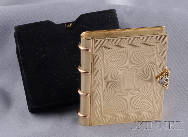 Appraisal: kt Gold and Diamond Book-form Compact Cartier c the engraved