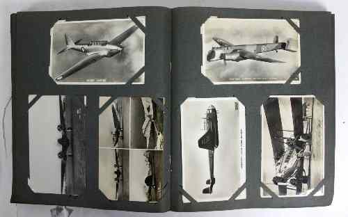 Appraisal: An postcard album of cards circa including ships aircraft trains