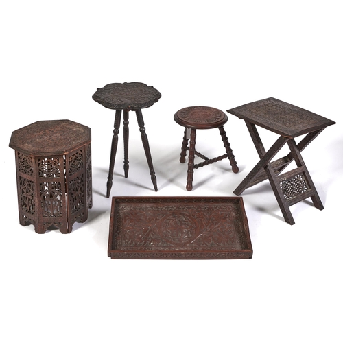 Appraisal: Three Indian carved hardwood tripod and coffee tables including a