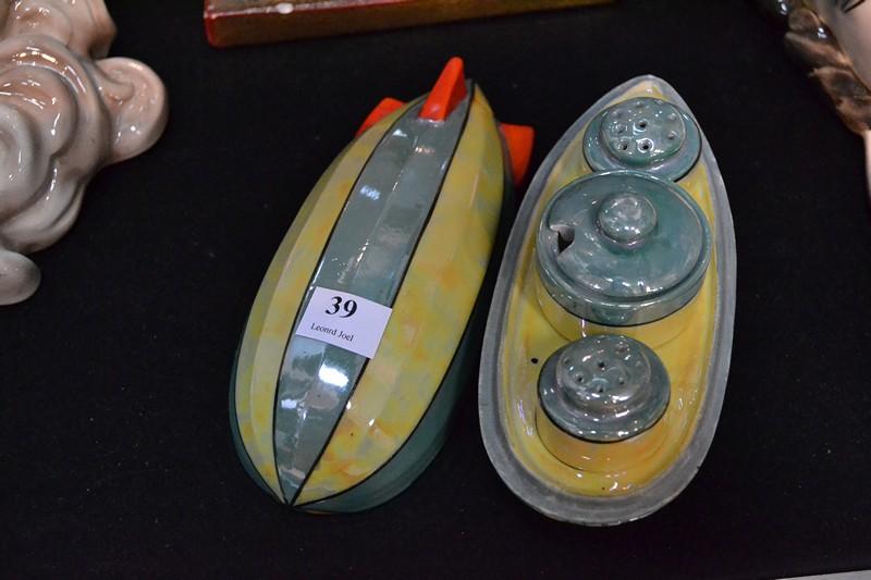 Appraisal: SMALL ART DECO LUSTRE GLAZED ZEPPELIN SHAPED CRUET SET