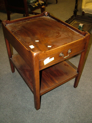 Appraisal: A mahogany tray top side table th century with end