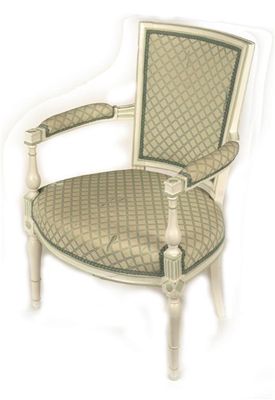 Appraisal: A cream painted and upholstered elbow chair on baluster turned