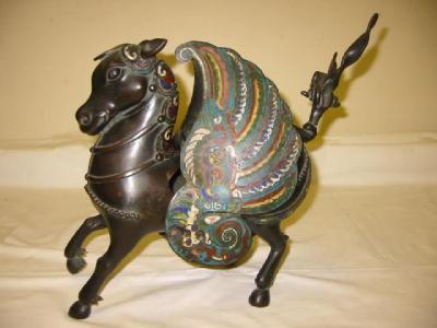 Appraisal: AN EASTERN BRONZE EQUESTRIAN CENSOR the prancing horse with enamelled