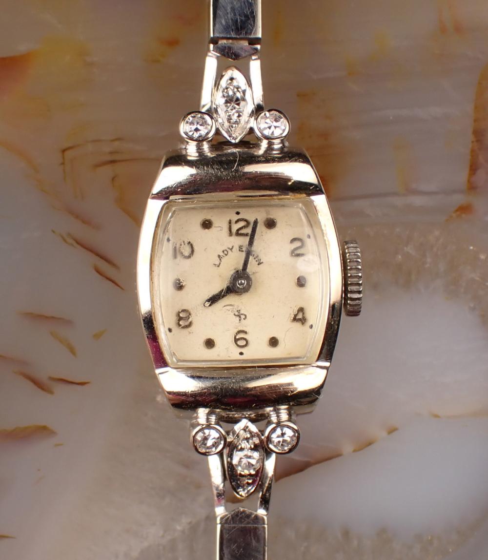 Appraisal: LADY ELGIN FOURTEEN KARAT GOLD AND DIAMOND WRISTWATCH having a