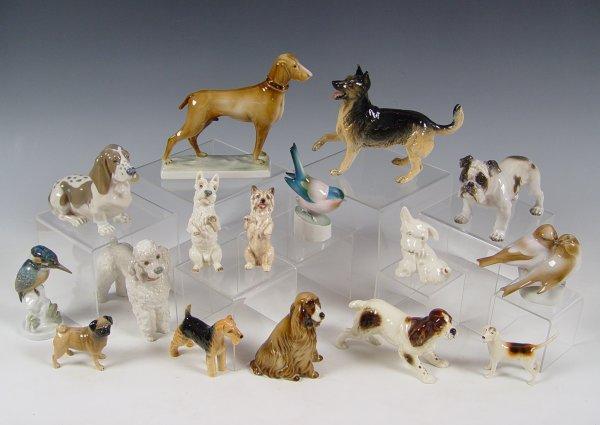 Appraisal: COLLECTION OF PORCELAIN DOGS AND BIRD BESWICK German Shepherd Hound