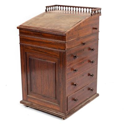 Appraisal: A George IV rosewood Davenport desk probably Gillows with three-quartered