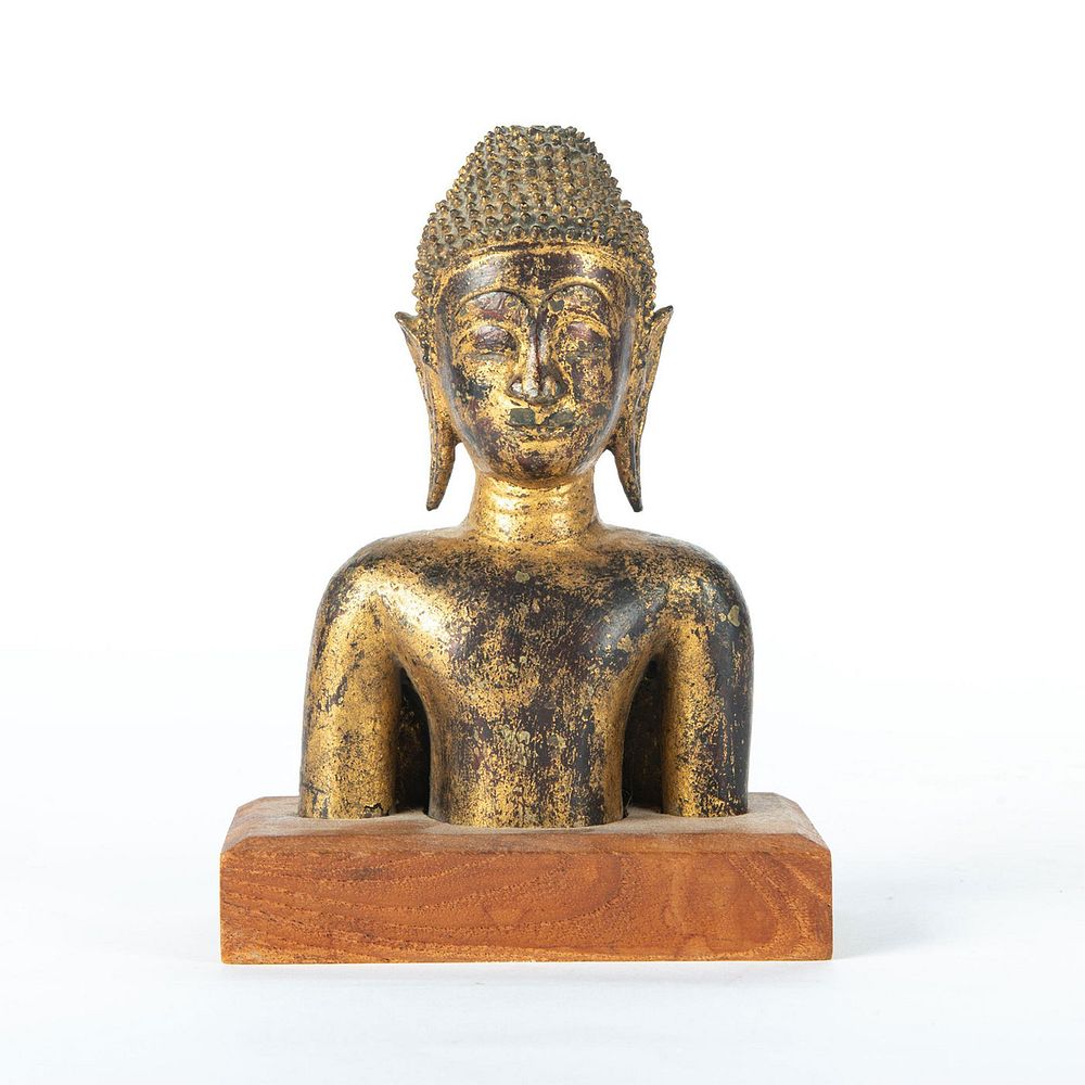 Appraisal: LAOS RATTANAKOSIN PERIOD BRONZE GILT SHRINE BUDDHA BUST Lacquer and