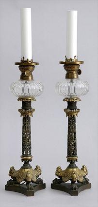 Appraisal: PAIR OF LOUIS PHILLIPE BRONZE PATINATED AND GILT-METAL OIL LAMPS