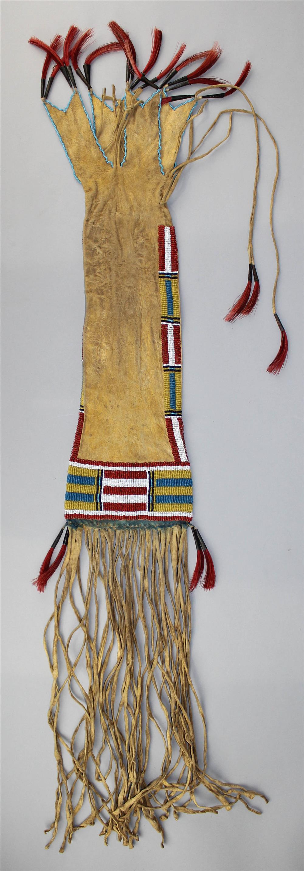 Appraisal: PLAINS BEADED FRINGED AND PIGMENTED HIDE PIPE BAG supple hide