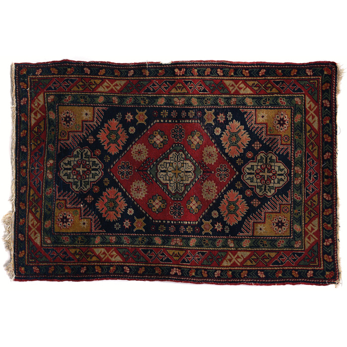 Appraisal: Persian rug c colorful stylized floral design with central medallion